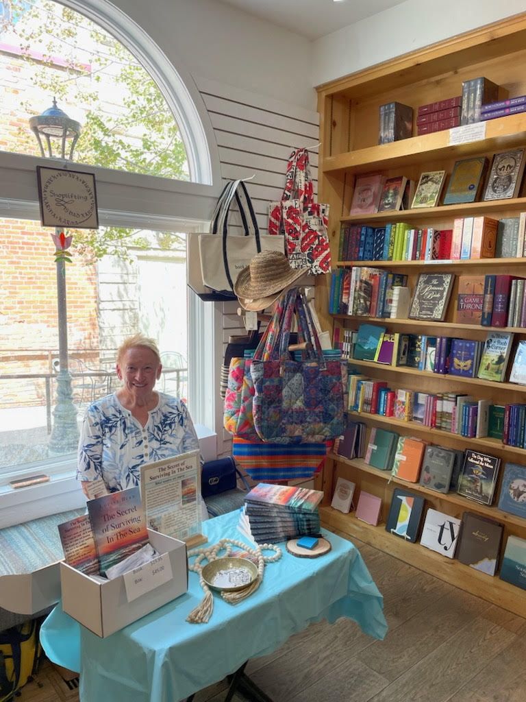 picture of Louise at Dollys Bookstore in Park City